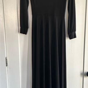 Women’s black jumper.